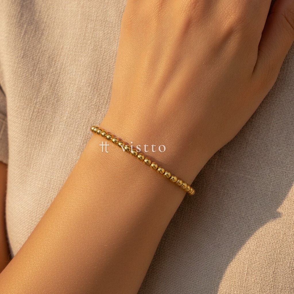 Pulsera dorada fina y abierta, diseño de brazalete de cuentas ovaladas lisas continuas y acabado brillante