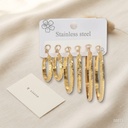 Set de tres pares de zarcillos dorados, argollas con greca