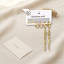 Set de tres pares de zarcillos dorados, huggie con hojas