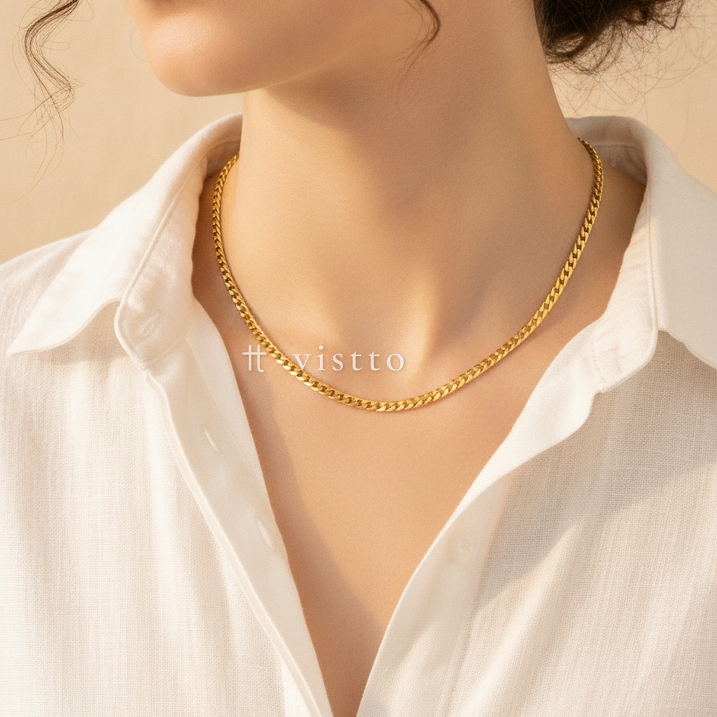 Collar dorado de cadena cubana barbada mediana, con cierre de langosta y extensor