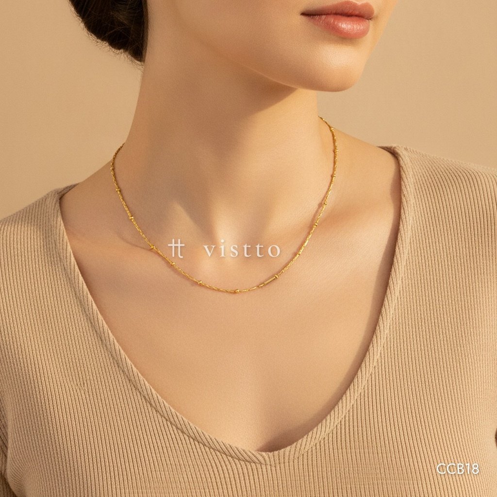Collar dorado, tubos pequeños con cuentas intercaladas