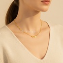 Collar dorado de cadena fina de eslabones ovalados alternados con eslabones en forma de ocho, con cierre de langosta y extensor