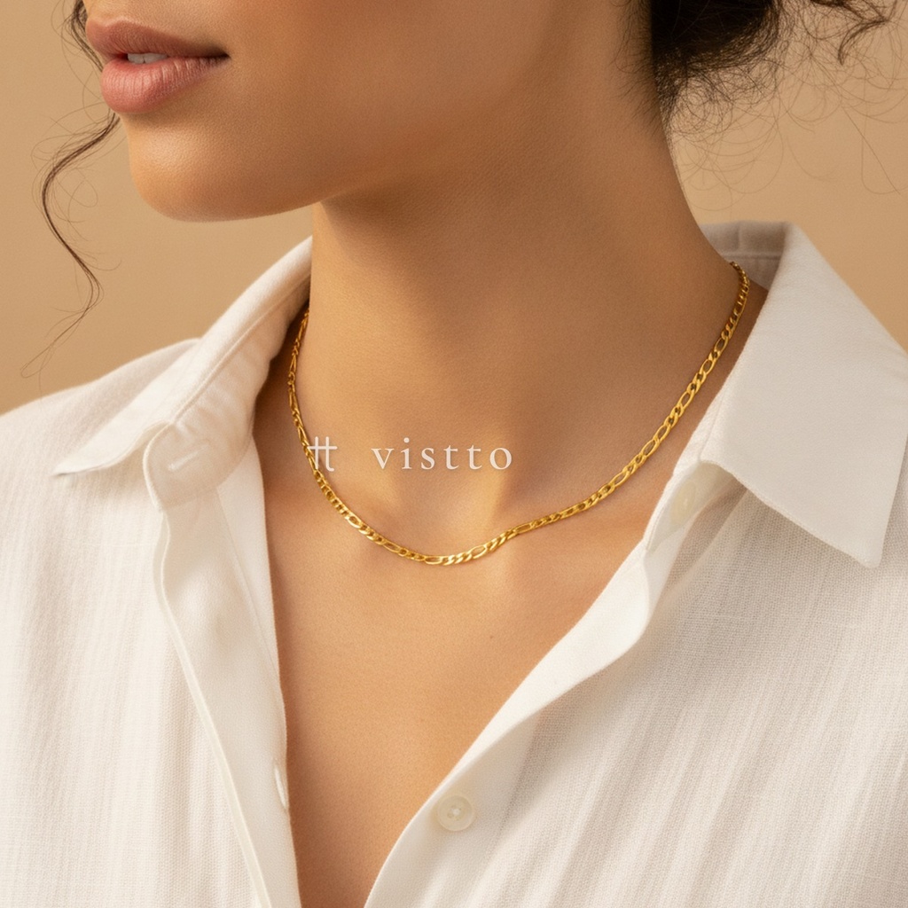Collar dorado de cadena figaro de eslabones cortos y largos alternados, con cierre de langosta y extensor