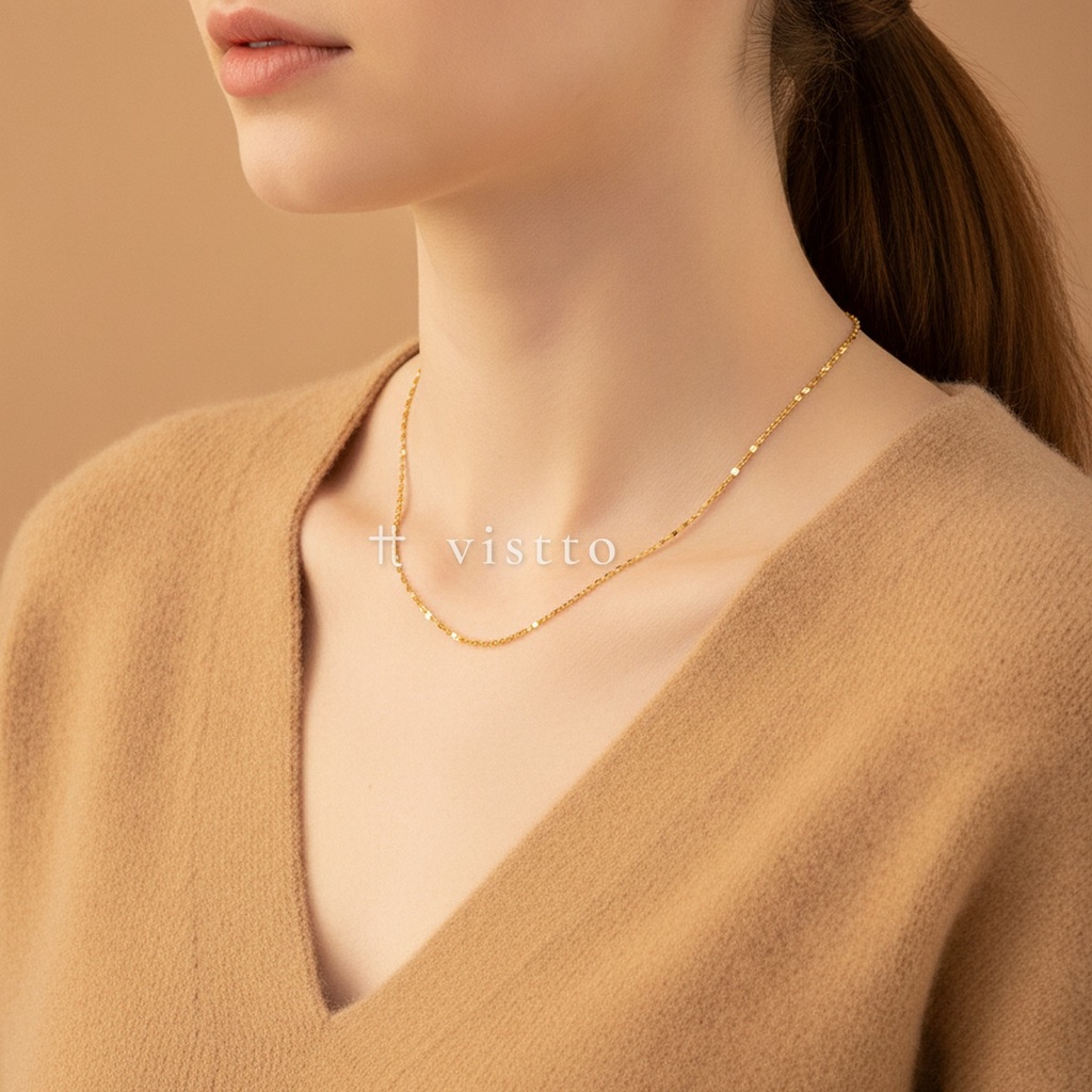 Collar dorado de cadena fina de eslabones facetados con extensor y acabado brillante