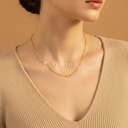 Collar dorado de cadena de eslabones finos con pequeñas bolitas espaciadas y extensor