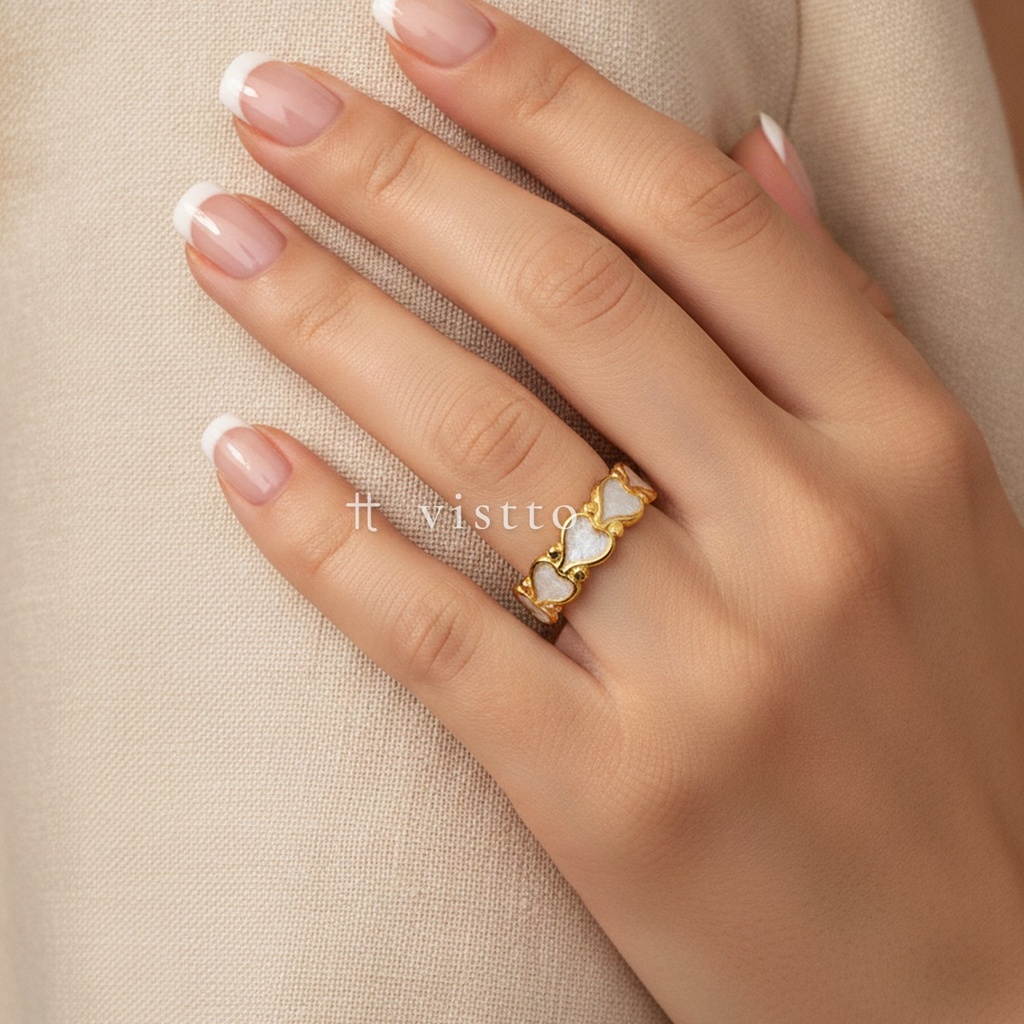 Anillo dorado y blanco abierto, diseño de banda de corazones consecutivos con relleno de esmalte blanco