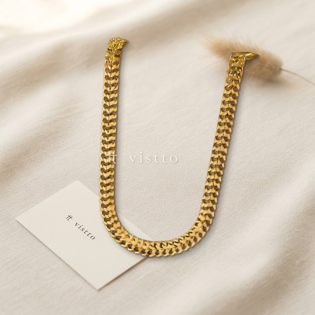 Collar dorado de cadena plana ancha de eslabones trenzados en espiga