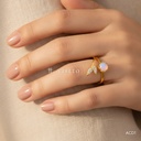 Anillo dorado abierto, envolvente con hoja de circonias