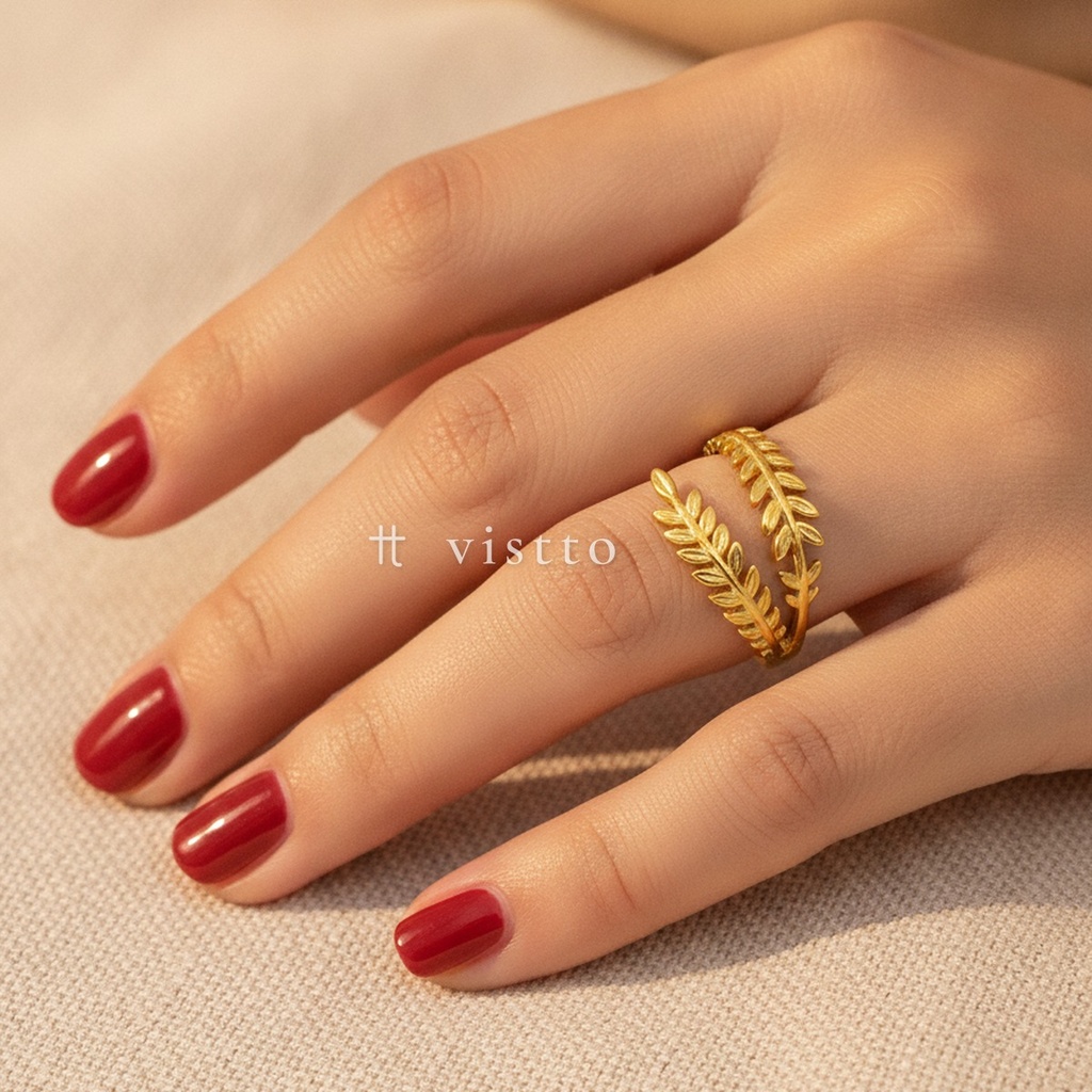 Anillo dorado abierto, diseño envolvente de dos ramas de espigas con acabado liso y brillante