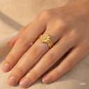 Anillo dorado abierto, banda con motivo frontal