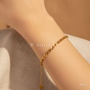 Pulsera dorada plana entretejida