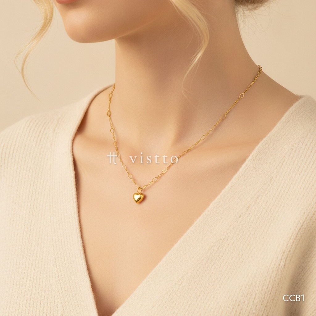 Collar dorado, eslabones mixtos con dije de corazón pequeño