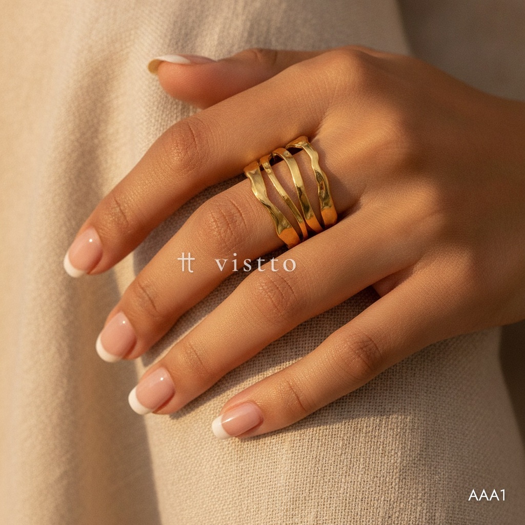 Anillo dorado abierto, cuatro bandas onduladas martilladas