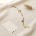 Pulsera dorada, cadena con bolitas y cruz de circonias