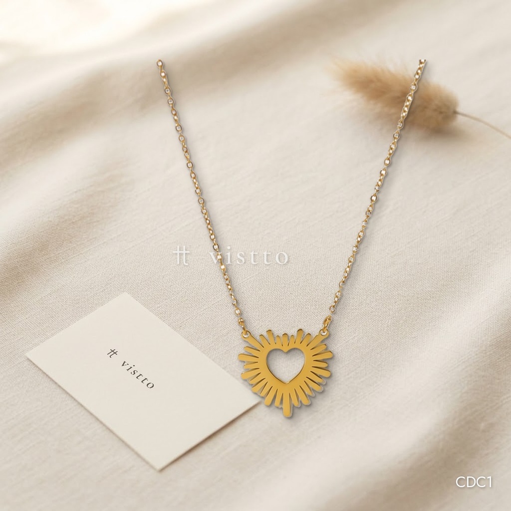 Collar dorado, fino con corazón calado y rayos