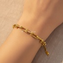 Pulsera dorada ancha con cierre de langosta y extensor, diseño de eslabones en forma de U con remates esféricos