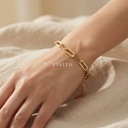 Pulsera dorada ancha con cierre de langosta y extensor, diseño de cadena de eslabones alargados con acabado satinado