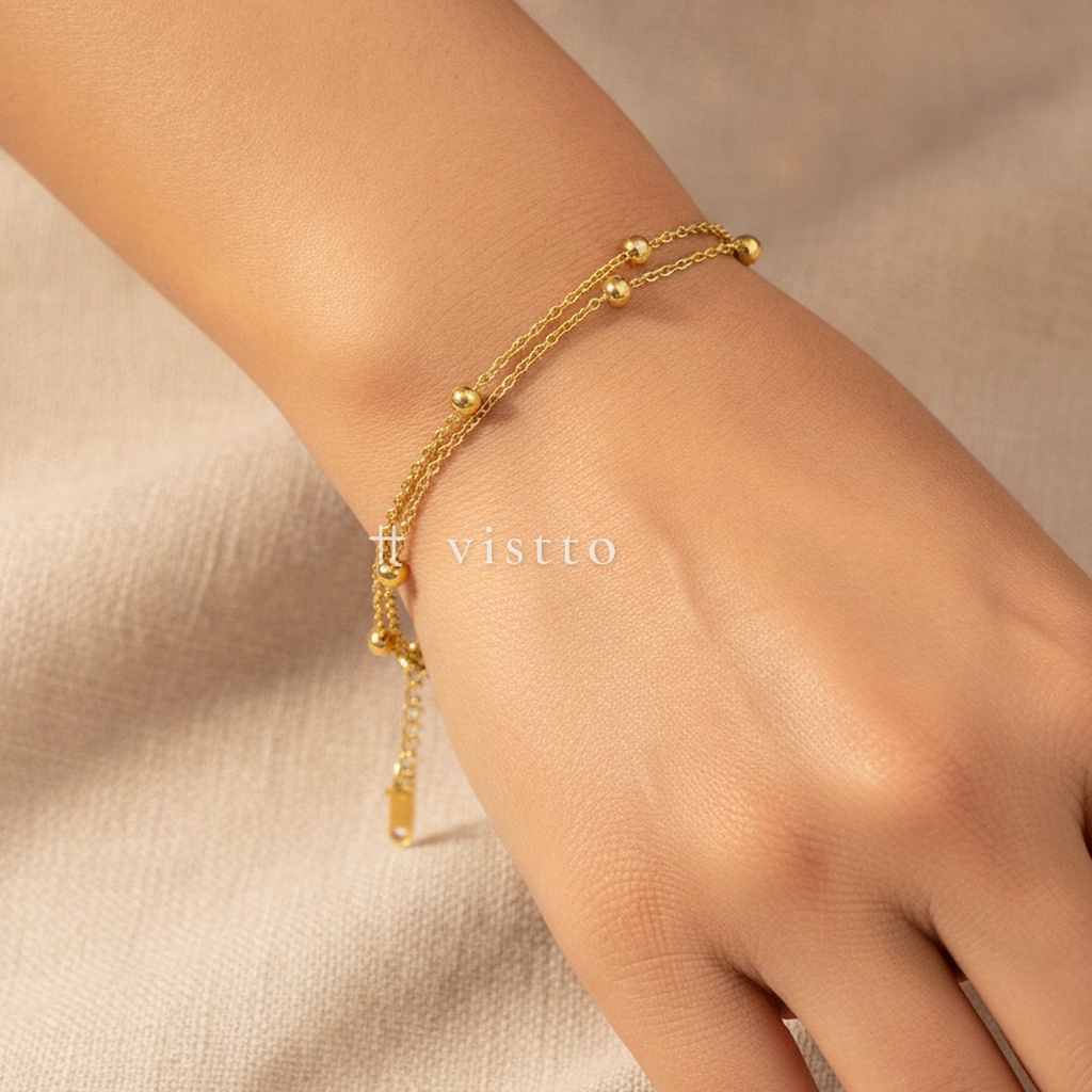 Pulsera dorada fina con cierre de langosta y extensor, diseño de doble cadena con cuentas esféricas