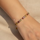 Pulsera dorada fina, diseño de línea continua de circonias cúbicas ovaladas multicolor y cierre de langosta con extensor