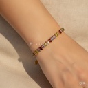 Pulsera dorada, línea de circonias ovaladas multicolor