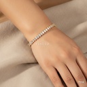 Pulsera dorada, línea de circonias ovaladas transparentes