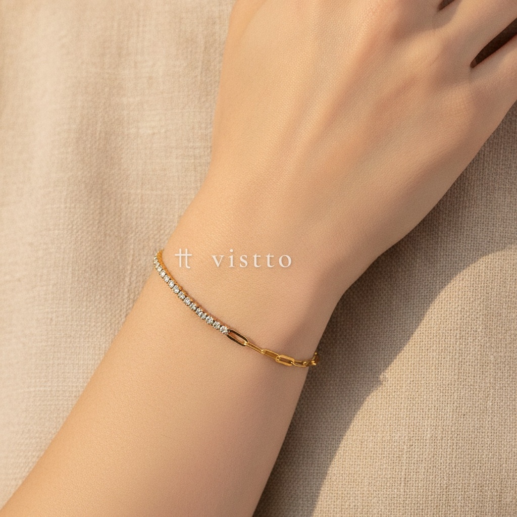 Pulsera dorada fina con cierre de langosta y extensor, diseño combinado de cadena de eslabones alargados y hilera de circonias cúbicas transparentes