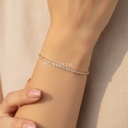 Pulsera dorada fina, diseño de línea continua de circonias cúbicas transparentes redondas y cierre de langosta con extensor